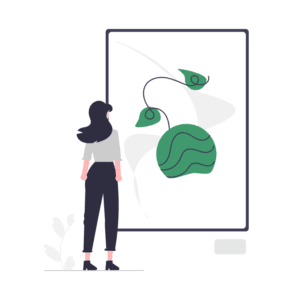 Eine Frau, die vor einem Kunstwerk steht - Kunsttherapeut